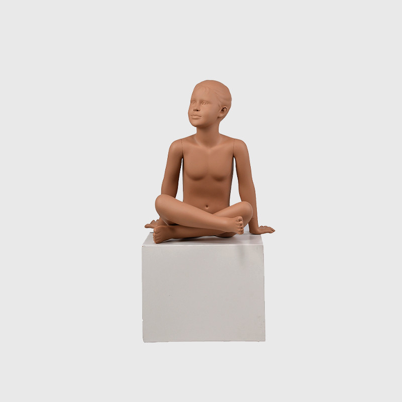 Realistic sitting girl mannequin